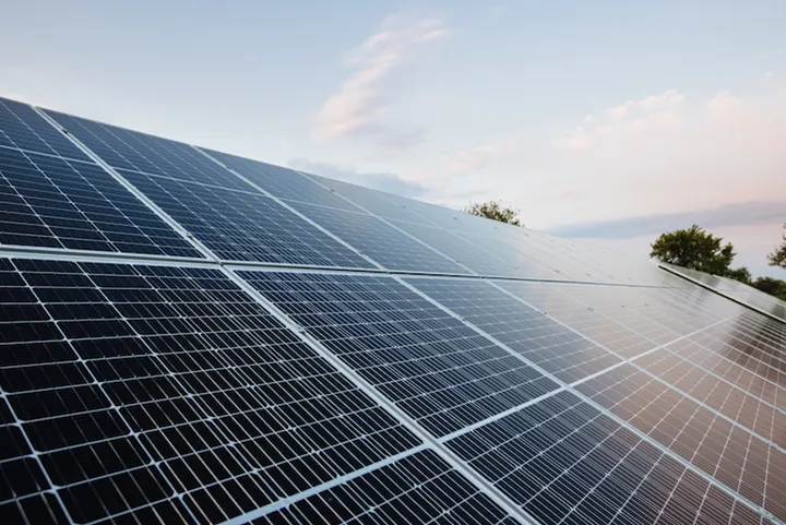Solar panels on a background of blue sky. Solar panels, photovoltaic, alternative power source - selective focus, copy space