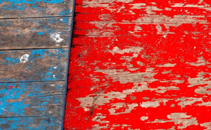 Close-up of a ship deck with weathered paint