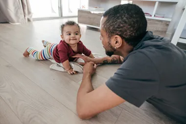 Teaching a child how to crawl