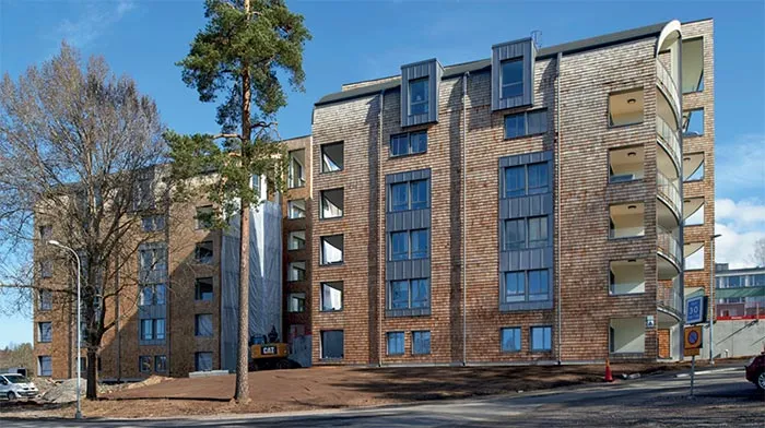 hoga-hus-i-massivtra-press