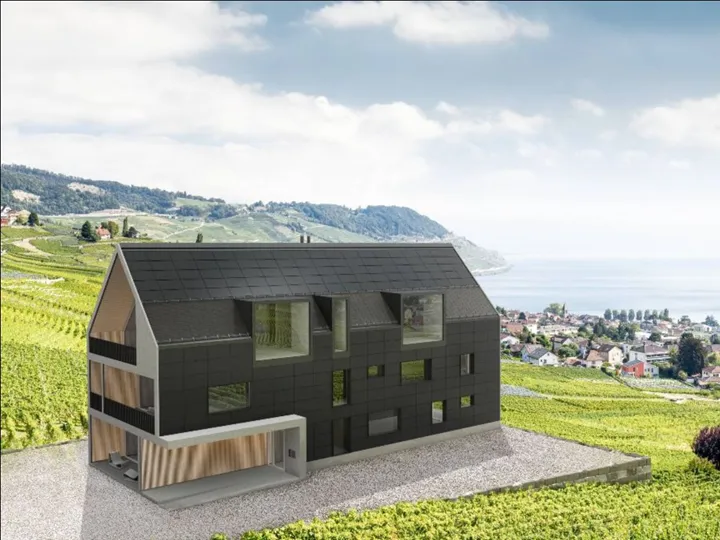 Bild hus i sluttning – Swisspearl