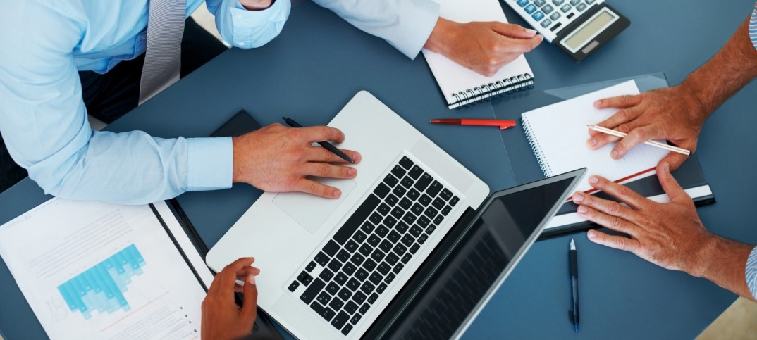 Cropped image of group of businesspeople working together in office - Consulting